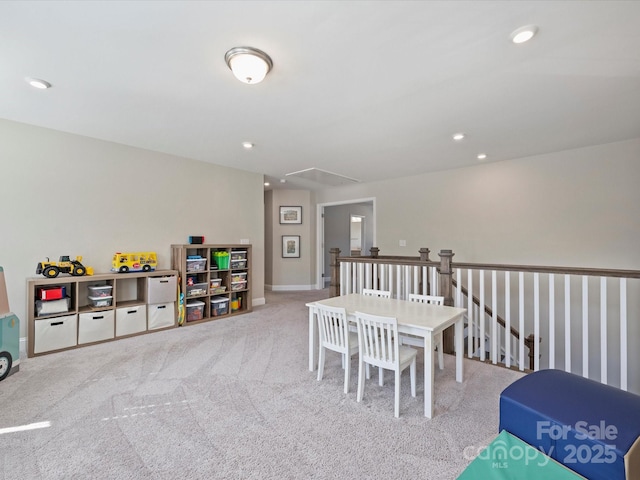 recreation room with attic access, recessed lighting, baseboards, and carpet floors