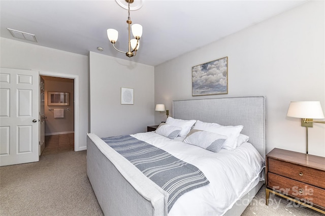 bedroom featuring a chandelier, visible vents, and light colored carpet