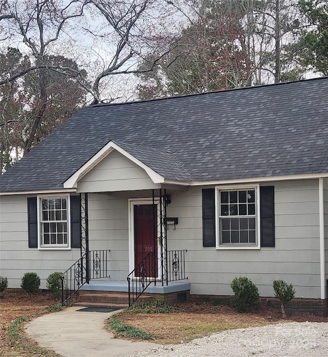 view of front of home with roof with shingles