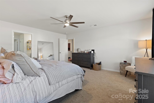 bedroom with visible vents, ceiling fan, baseboards, and carpet floors