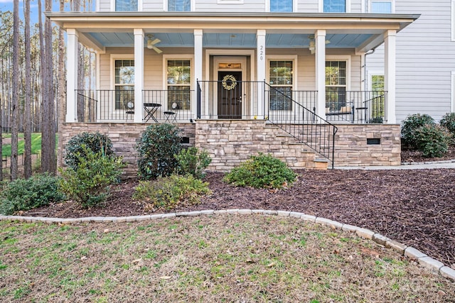 property entrance featuring covered porch