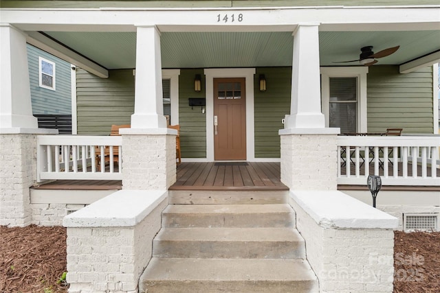 property entrance featuring covered porch