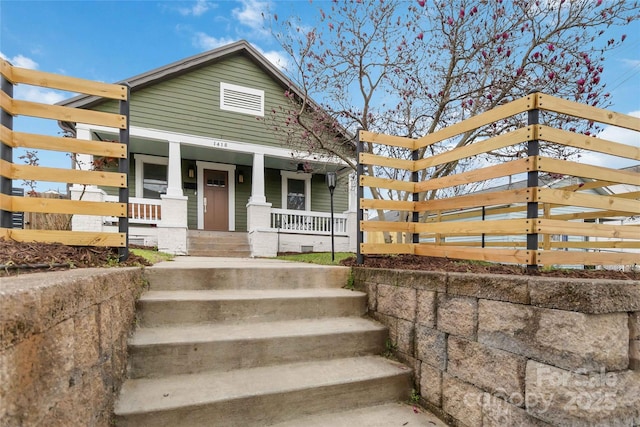 bungalow featuring covered porch