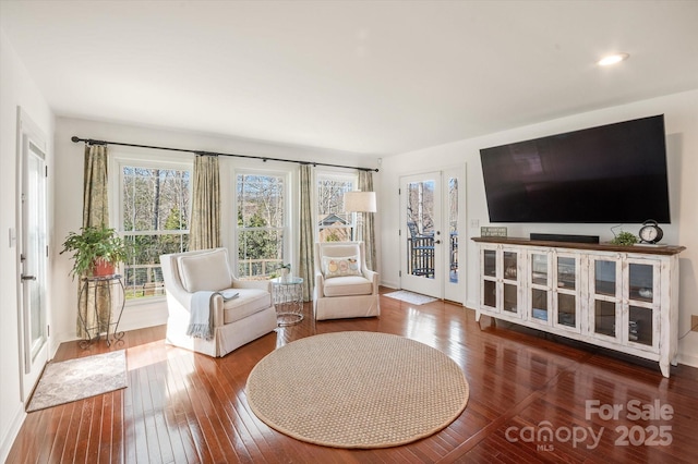 sitting room featuring hardwood / wood-style flooring