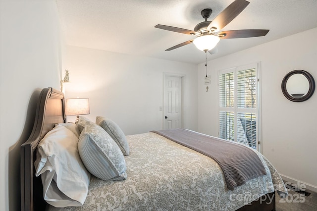 bedroom with baseboards and ceiling fan