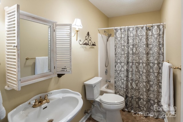 full bath with toilet, radiator heating unit, shower / tub combo, and a sink