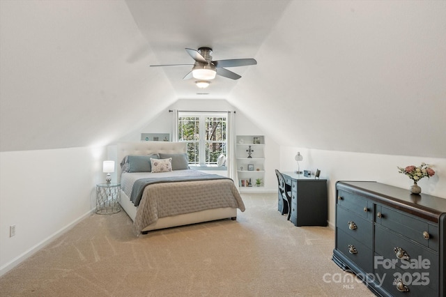 bedroom with lofted ceiling, a ceiling fan, baseboards, and light carpet