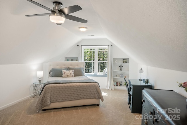 bedroom featuring baseboards, light colored carpet, visible vents, and ceiling fan