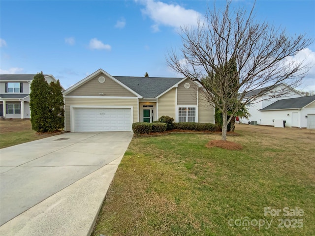 single story home with a garage, concrete driveway, and a front lawn