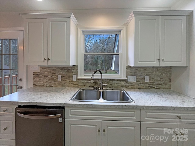 kitchen featuring a sink, white cabinets, and dishwasher