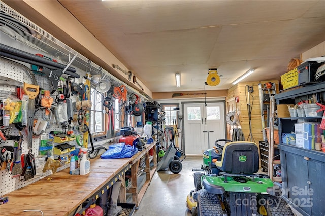 garage with a workshop area