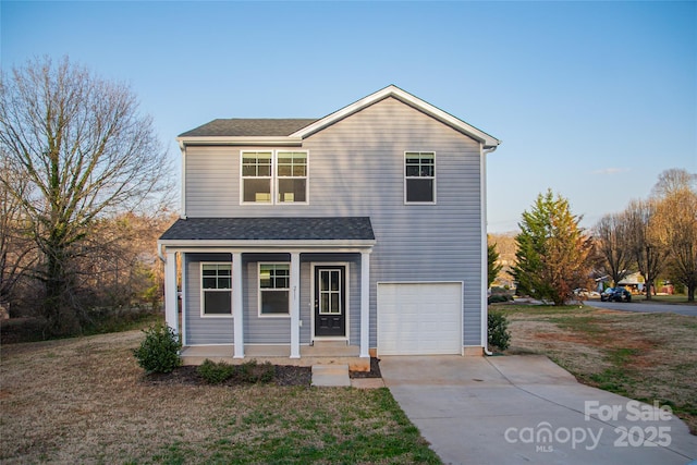 traditional-style home featuring a garage, concrete driveway, roof with shingles, and covered porch