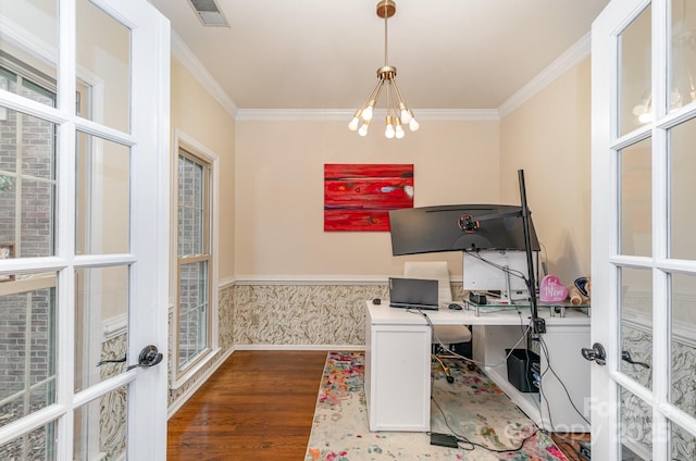home office featuring visible vents, french doors, crown molding, and wood finished floors