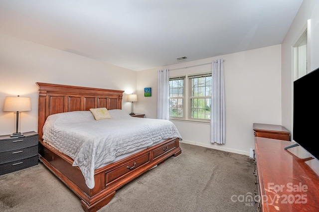 bedroom with carpet flooring, baseboards, and visible vents