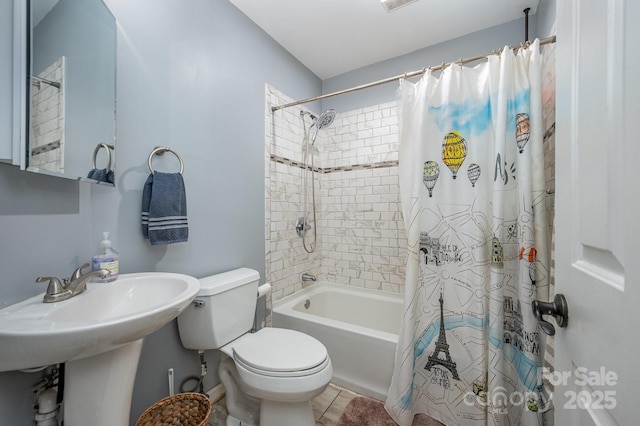 bathroom featuring toilet, shower / bathtub combination with curtain, and tile patterned floors