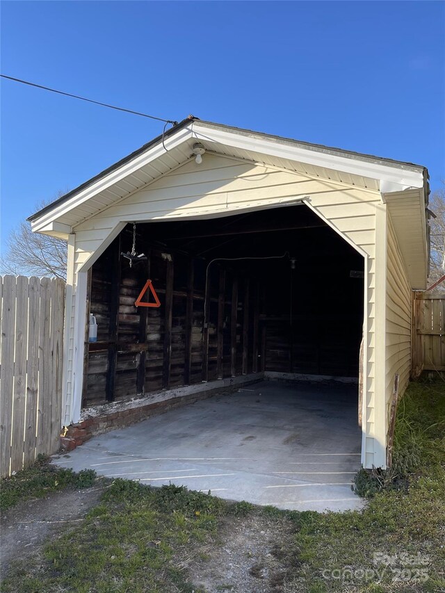 garage featuring fence