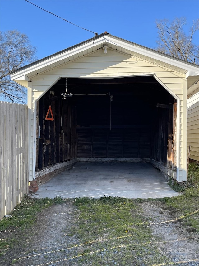 garage featuring fence