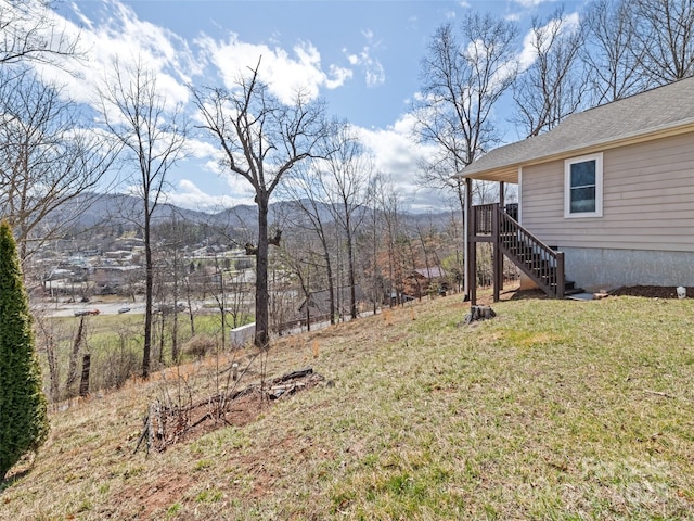 view of yard featuring stairway and a mountain view