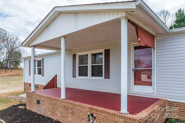 view of home's exterior featuring covered porch