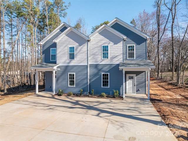 view of front of house featuring concrete driveway