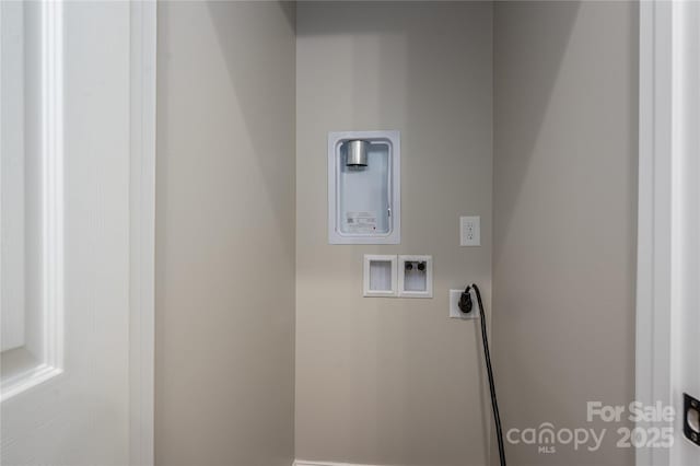 laundry area featuring laundry area, washer hookup, and hookup for an electric dryer