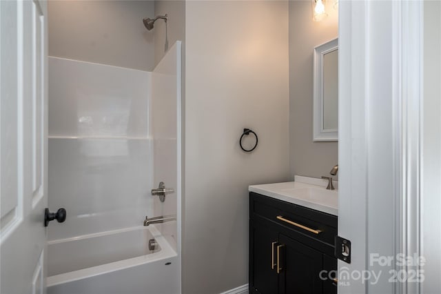 bathroom with bathing tub / shower combination and vanity