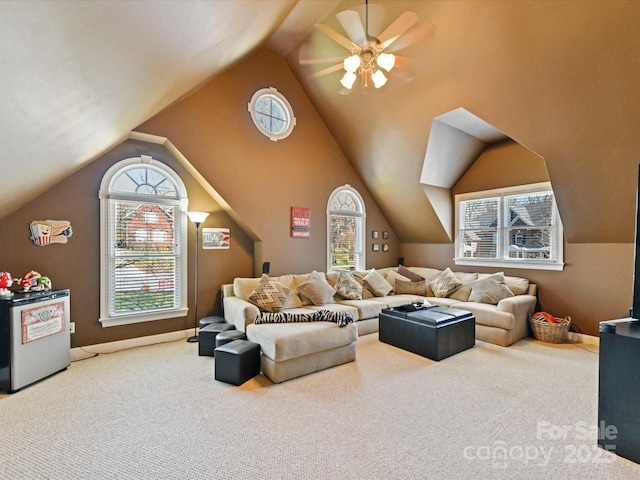 interior space with lofted ceiling and ceiling fan