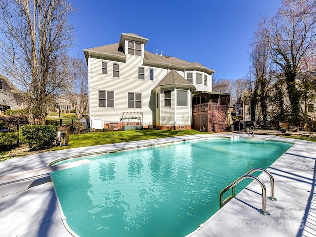 view of pool featuring a fenced in pool, fence, stairway, and a lawn