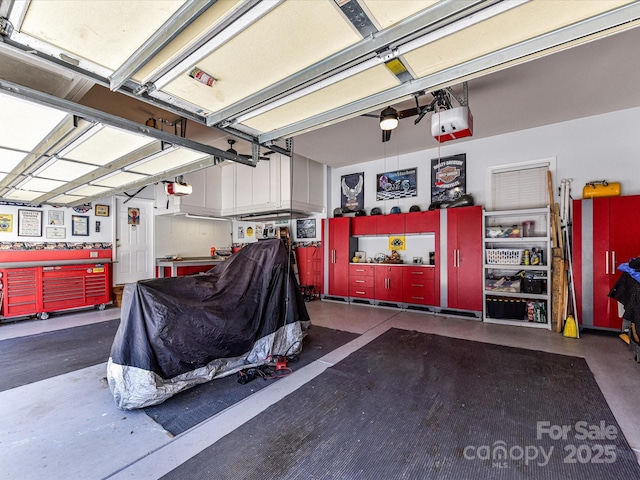 garage featuring a garage door opener