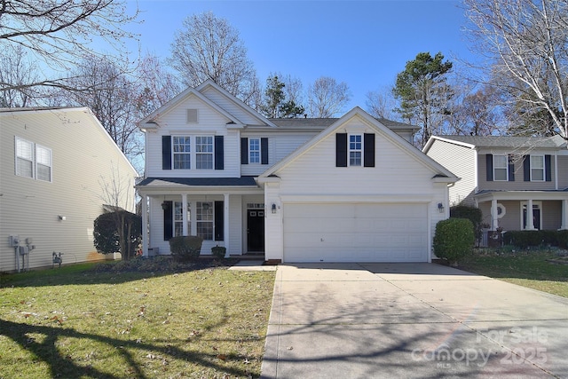 traditional-style house featuring concrete driveway, a garage, covered porch, and a front yard