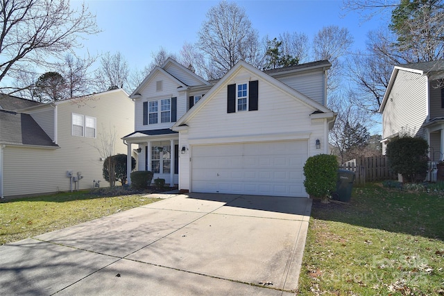 traditional home with driveway and a front yard