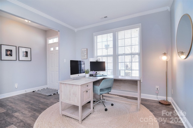 office space with crown molding, wood finished floors, visible vents, and baseboards