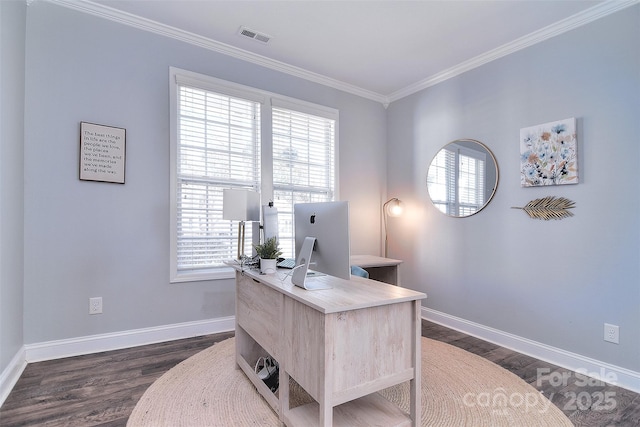 office space with visible vents, plenty of natural light, baseboards, and ornamental molding