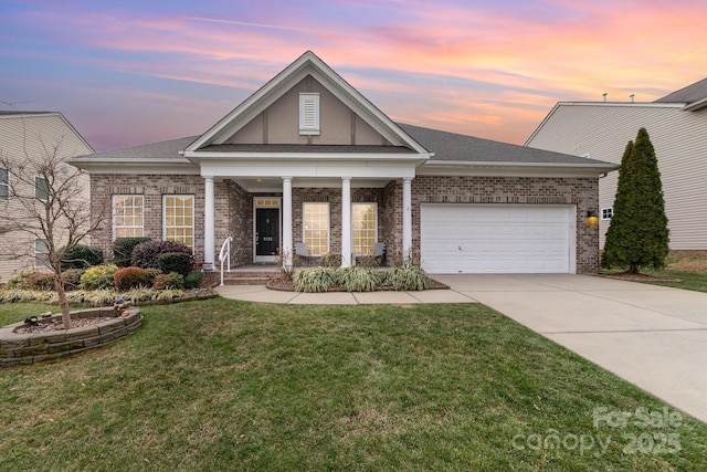 view of front facade with brick siding, roof with shingles, concrete driveway, an attached garage, and a front lawn