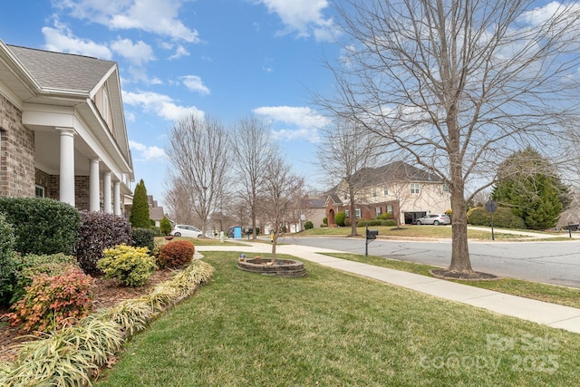 view of yard with a residential view