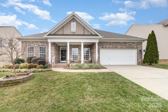 view of front facade featuring brick siding, a shingled roof, concrete driveway, an attached garage, and a front yard