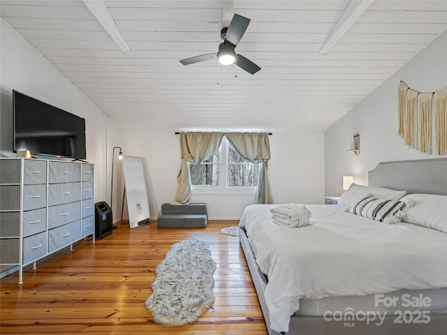 bedroom with wood ceiling, wood-type flooring, and ceiling fan