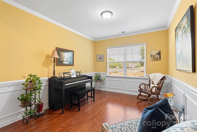 4001 Perth Rd, Fort Mill, SC 29707 - living area featuring wood finished floors, visible vents, crown molding, and a wainscoted wall