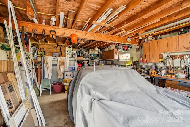 garage featuring a workshop area