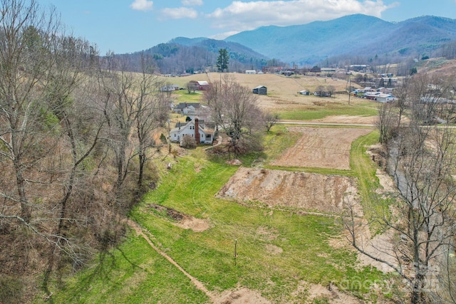 bird's eye view with a mountain view and a rural view