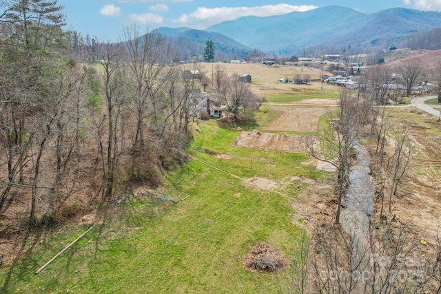 aerial view featuring a rural view and a mountain view