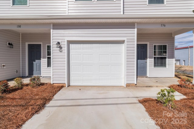 garage with driveway