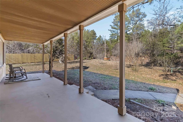 view of patio / terrace featuring fence