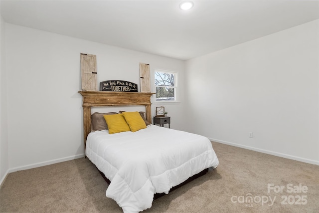 bedroom featuring recessed lighting, carpet flooring, and baseboards