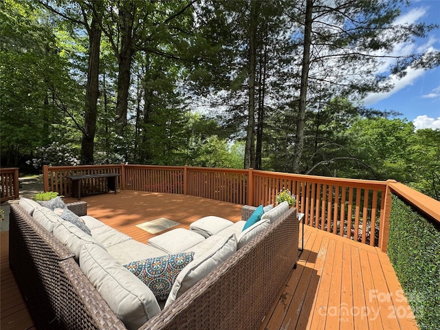 15 Elmwood Ln Unit 161, Asheville, NC 28803 - wooden terrace featuring an outdoor living space and view of wooded area