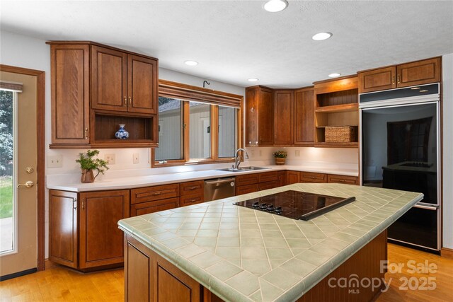 15 Elmwood Ln Unit 161, Asheville, NC 28803 - kitchen with open shelves, black electric stovetop, dishwasher, tile counters, and recessed lighting