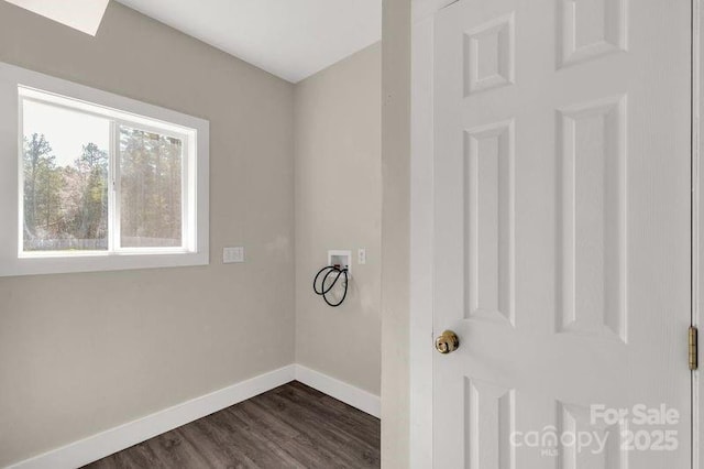 clothes washing area featuring laundry area, hookup for a washing machine, baseboards, and dark wood-style flooring