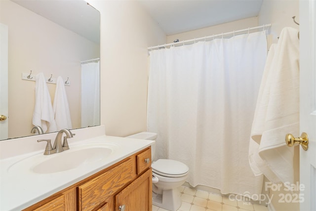 full bath with tile patterned floors, toilet, and vanity