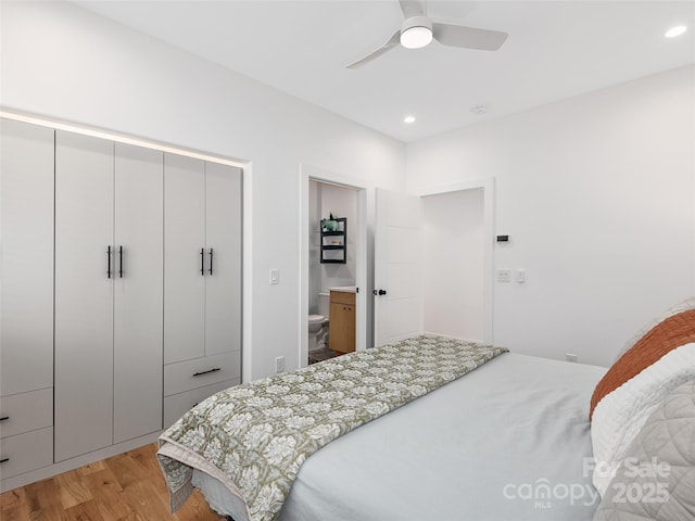 433 W Haywood St, Asheville, NC 28801 - bedroom featuring recessed lighting, light wood-style floors, a closet, ceiling fan, and ensuite bath