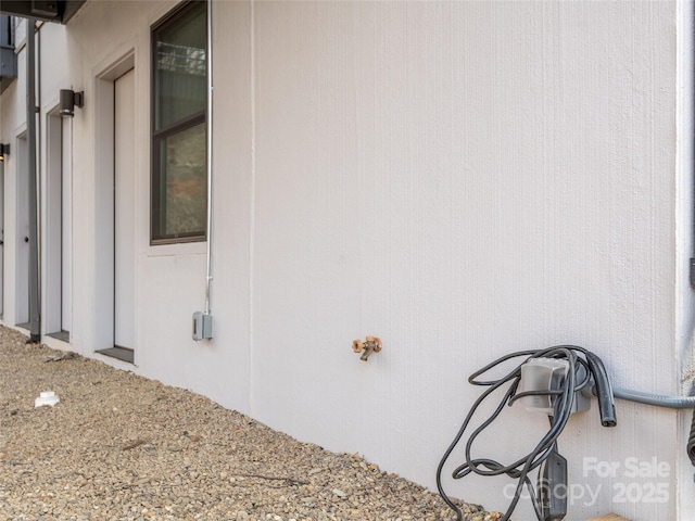 433 W Haywood St, Asheville, NC 28801 - view of side of home with stucco siding